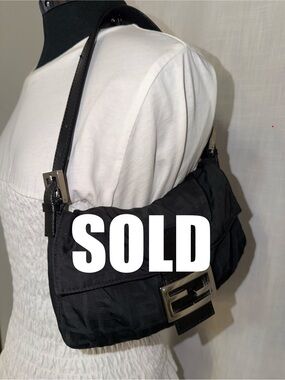 Authentic Fendi Zucca Baguette in Black